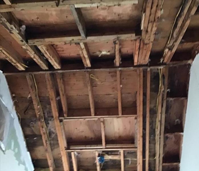 exposed beams after drywall removal