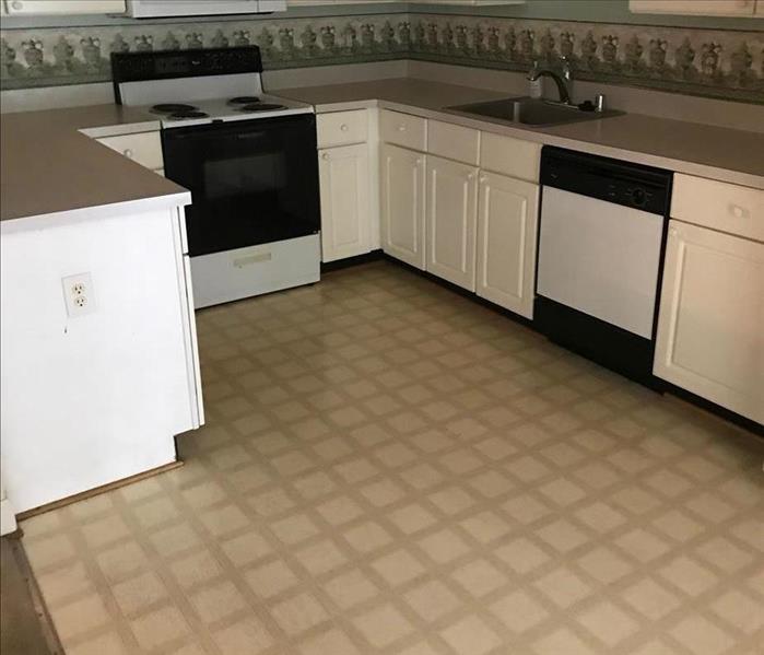 kitchen with old vinyl flooring
