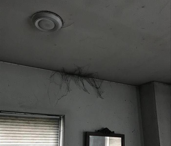 soot web in corner of ceiling
